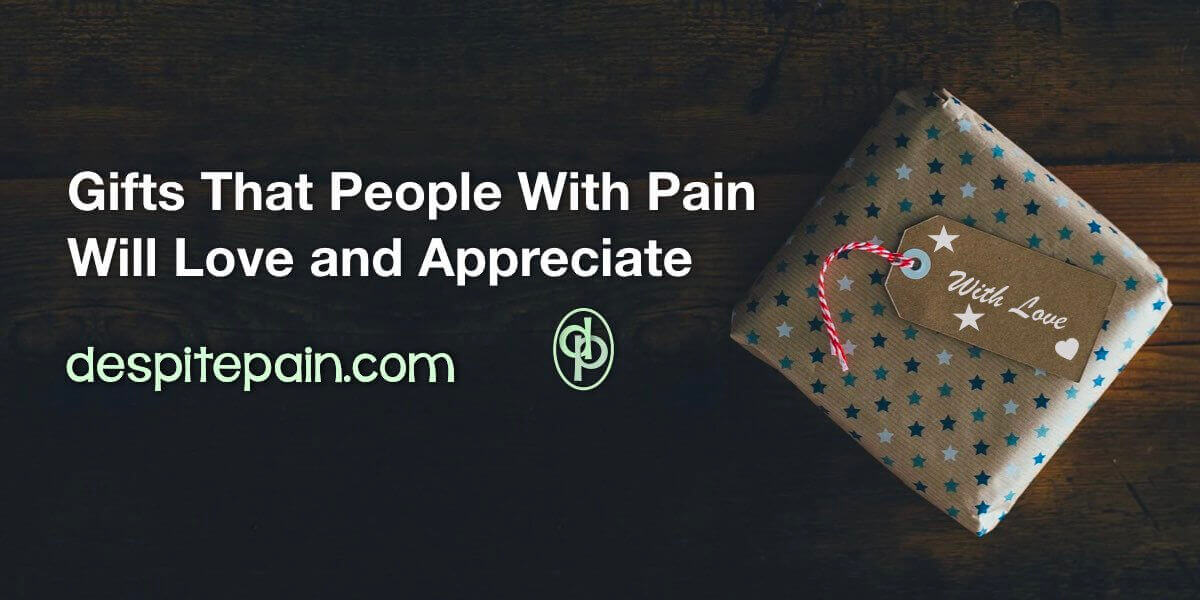 Gifts that people with pain will love and appreciate. Picture of a wrapped gift on a wooden surface. Gift tag says, with love.