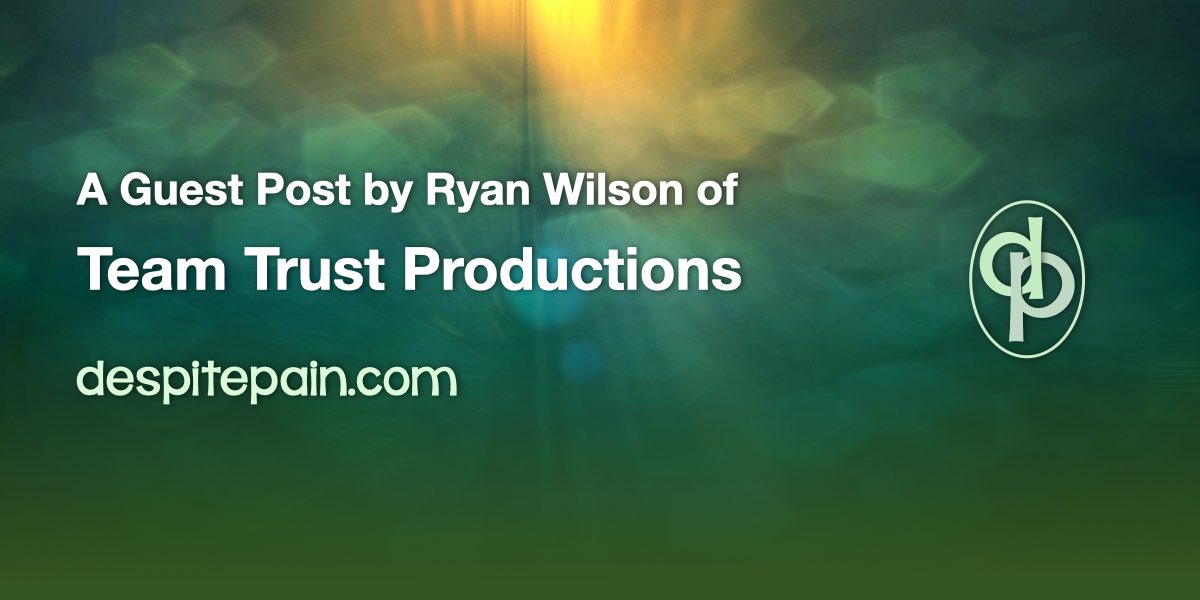 A guest post by Ryan Wilson of Team Trust Productions is written in white on a dark green background of trees which has some yellow sunlight shining through at the top.
